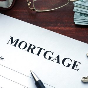 Photo of a mortgage agreement which is for an elderly client who wants to use equity release to get a new home