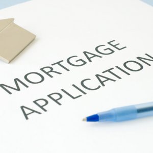 A photo of a mortgage application which is used by the elderly and provided by Acclaimed Mortgage Consultancy to help people with their equity release