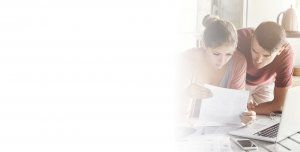 background image of young couple organising protection insurance